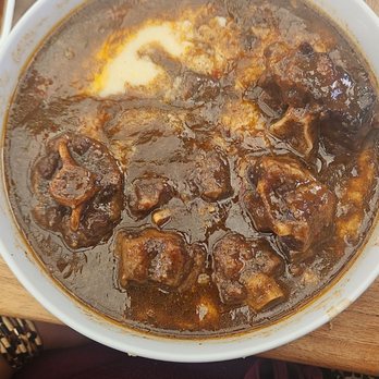 Mangos Southern Kitchen and Bar - Oxtail and grits - Breakfast & Brunch Near Me - Tampa, Florida