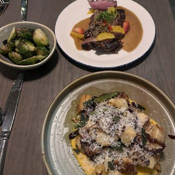 The Shore - Top: Liberty Duck Breast with an added side of Brussel sprouts Bottom: Parmesan Ricotta Gnocchi with braised wagyu - Bars Near Me - Reno, Nevada The Shore - Top: Liberty Duck Breast with an added side of Brussel sprouts Bottom: Parmesan Ricotta Gnocchi with braised wagyu - Bars Near Me - Reno, Nevada
