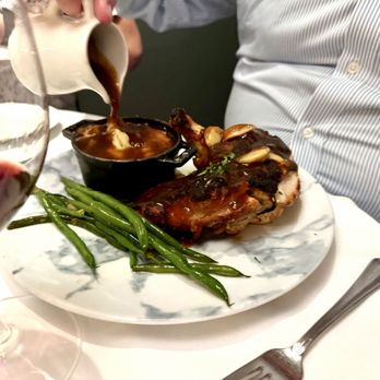 Bis on Main - Crispy Garlic Chicken getting sauced! - New American Near Me - Bellevue, Washington Bis on Main - Crispy Garlic Chicken getting sauced! - New American Near Me - Bellevue, Washington