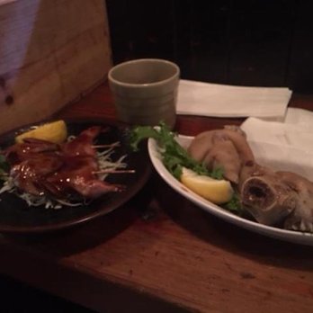 Kenka - Tonsoku pigs feet on the right and Kaeru no Karaage on the left. The Kaeru no Karaage reminds me of Ash releasing Greninja. - Sushi Bars Near Me - New York, New York