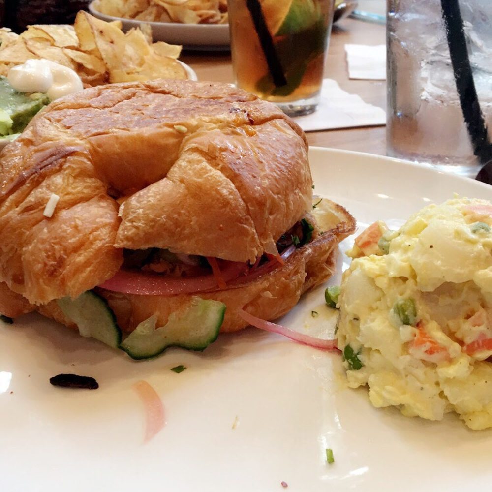 Cappyccino's - House special- smoked salmon croissant sandwich with potato salad - New American Near Me - San Antonio, Texas