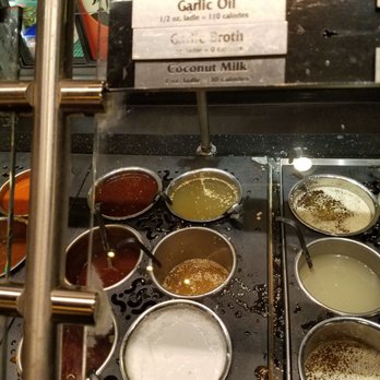 HuHot Mongolian Grill - The garlic oil and other sauces. - Mongolian Near Me - Sandy, Utah HuHot Mongolian Grill - The garlic oil and other sauces. - Mongolian Near Me - Sandy, Utah