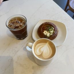 Vanilla latte, Shakshuka pastry, & iced Americano Vanilla latte, Shakshuka pastry, & iced Americano