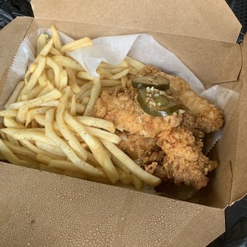 Eugene's Hot Chicken - My tender plate in the "Southern" style. Also a piece of bread under my chicken as well. - Food Trucks Near Me - Birmingham, Alabama