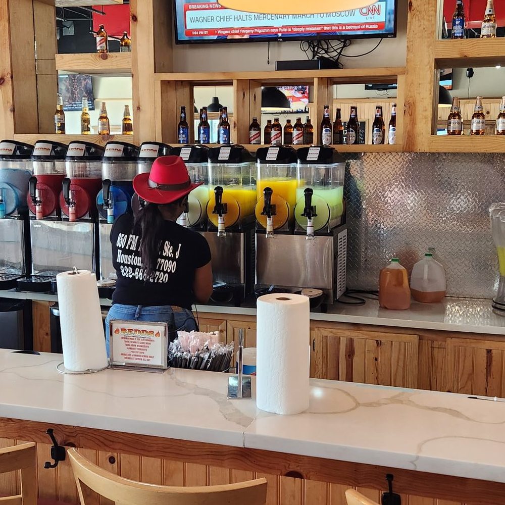 REDDS - Daiquiri to go being prepared. - American Near Me - Houston, Texas