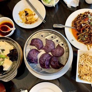 Masterpiece - Left: Tofu hot pot Middle: Vegetarian dumplings Right: Stir-fried pork - Szechuan Near Me - Duluth, Georgia