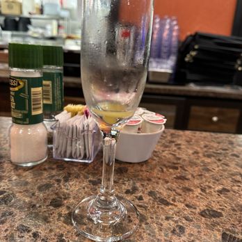 The Kitchen Dunedin - a glass of wine on a counter - Breakfast & Brunch Near Me - Dunedin, Florida