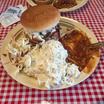Whole Hog Cafe - Pulled pork sandwich, potato salad, coleslaw, and beans! - Barbeque Near Me - Springfield, Missouri