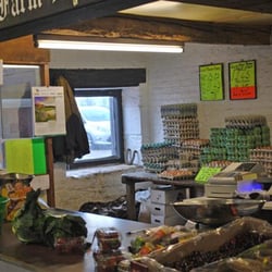 Lydiate Hall Farm Shoppe - Farm shop counter with eggs behind.