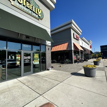Dunkin' -  a person's thumb in front of a store - Donuts Near Me - Linthicum Heights, Maryland