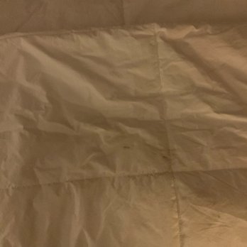 CD One Price Cleaners - Brand new destroyed blanket, that the cleaners stained and burned in the stains it was a beautiful white IKEA blanket. - Laundry Services Near Me - Libertyville, Illinois
