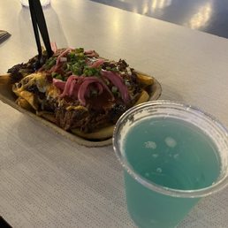Pulled pork loaded fries and Baja Sipper