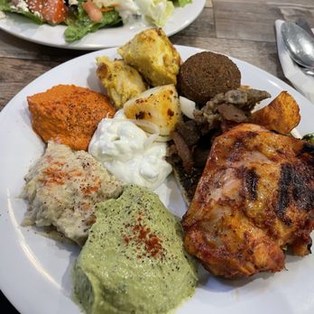 Dimassi's Mediterranean Buffet - Variety of hummus and garlic sauce with baked chicken and falafel. - Mediterranean Near Me - Cerritos, California Dimassi's Mediterranean Buffet - Variety of hummus and garlic sauce with baked chicken and falafel. - Mediterranean Near Me - Cerritos, California