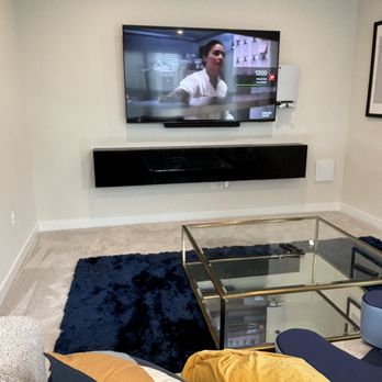 MILE - Wireless 75", floating entertainment center, floating soundbar and ps5! - TV Mounting Near Me MILE - Wireless 75", floating entertainment center, floating soundbar and ps5! - TV Mounting Near Me