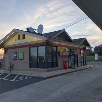 Chevron - the outside of a restaurant at sunset - Gas Stations Near Me - Penryn, California