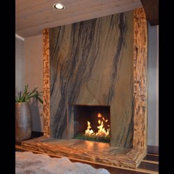 Reclaimed Wood San Diego - Hand hewn beams from the late 17th century trimming out this stone work.
