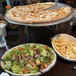 Rivoli Pizzeria - Pizza, tabouli salad, wings