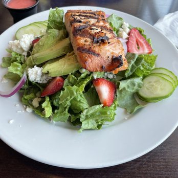 Mile Marker 158 Dockside - Grilled salmon, strawberries, avocado slices, cucumber slices, red onion slices and feta cheese, raspberry vinaigrette dressing - American Near Me - Orange Beach, Alabama Mile Marker 158 Dockside - Grilled salmon, strawberries, avocado slices, cucumber slices, red onion slices and feta cheese, raspberry vinaigrette dressing - American Near Me - Orange Beach, Alabama