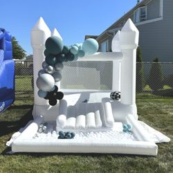 Nonstop Party Rentals - White bounce house with custom balloon add on