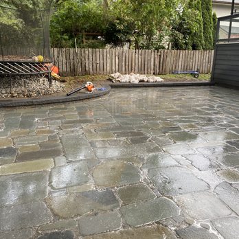 De Castro Contracting - a patio being cleaned - Landscaping Near Me - Coquitlam, British Columbia