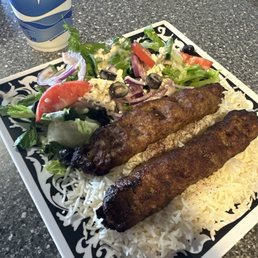 Spicy Chicken Kebobs with Rice and Salad
