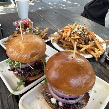 Scolari's Good Eats - Blueberry bacon blue cheese burger, garlic scampi fries (half order - left, full order - right) - Burgers Near Me - Alameda, California