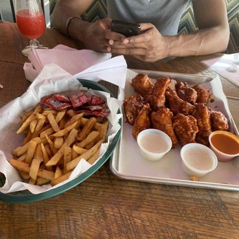 CRAFThouse - Maroon and gold Wings and fries - New American Near Me - San Marcos, Texas