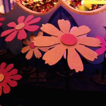 Its A Small World - Beautiful bright flowers on the ride! - Amusement Parks Near Me - Anaheim, California Its A Small World - Beautiful bright flowers on the ride! - Amusement Parks Near Me - Anaheim, California