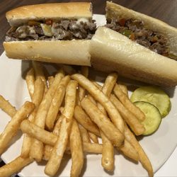 The Five Four Bar & Grill - Cheese Steak - average -- meat was decent, cheese was good just needed a bit more. Hot peppers gave it some kick. Roll was fresh.