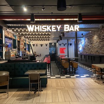 SmokeWorks - Bar area with additional seating - Barbeque Near Me - Bloomington, Indiana