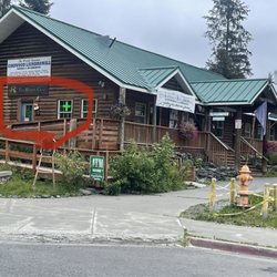 The Herbal Cache - They are the small shop at the end of the building.