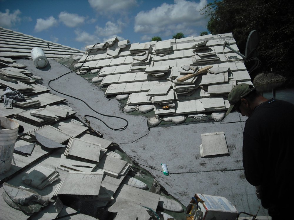 Slide of J & H Roofing