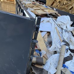 Junk Removal and Hauling Services  - Unloading trash