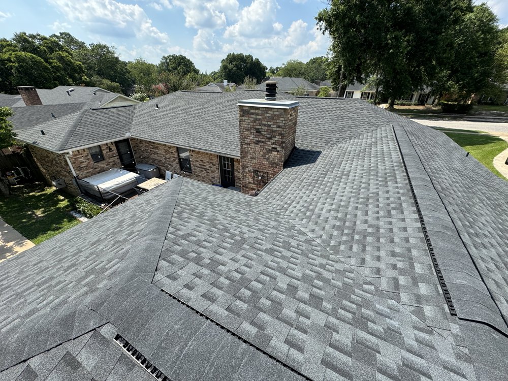 Slide of RainTight Roofing & Construction