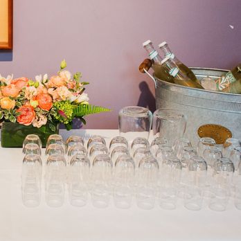 Sparrow Lane - Tabletop Event Rentals - Close up of drinks table (rented champagne flutes, carafes, and metal beverage/ice bin). - Party Equipment Rentals Near Me - Concord, Massachusetts