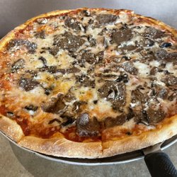 Cafe Paisano - Mushrooms and sausage pizza. Thin crush and crispy bottom. 5 stars!
