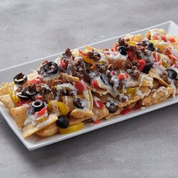 Expedition Cafe - Italian Nachos! One of our most popular menu items. - Pizza Near Me - Lubbock, Texas