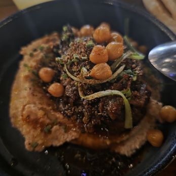 Sparrow + Wolf - Hummus with crispy chickpeas, topped with oxtail. - New American Near Me - Las Vegas, Nevada Sparrow + Wolf - Hummus with crispy chickpeas, topped with oxtail. - New American Near Me - Las Vegas, Nevada