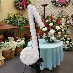 Flowers and Gifts of Rocky Mount - A wide selection of sympathy designs in silk flowers and also available in fresh flowers. Specialty designs are handcrafted too.