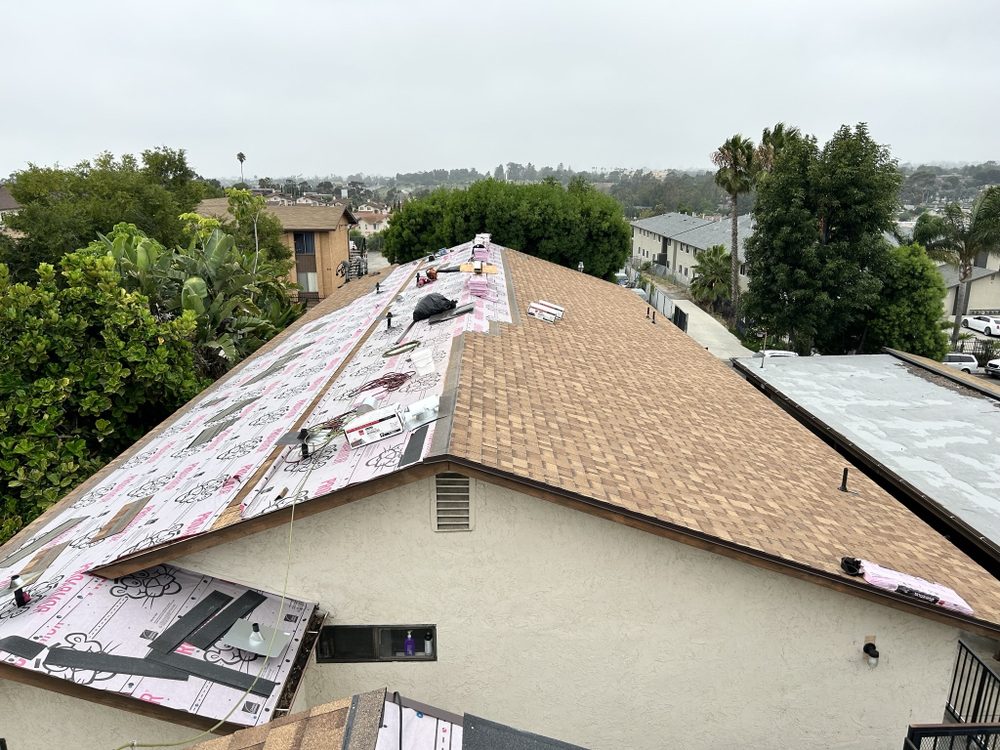 Slide of Mo's Professional Roofing