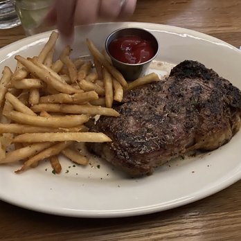 Oak House - Medium rare ribeye with truffle fries. - New American Near Me - Birmingham, Alabama