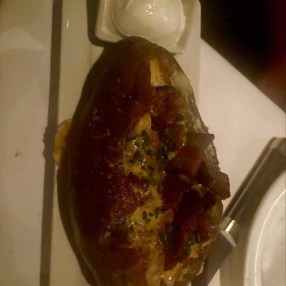 Dominick's Steakhouse - A good ol loaded baked potato - Steakhouses Near Me - Scottsdale, Arizona Dominick's Steakhouse - A good ol loaded baked potato - Steakhouses Near Me - Scottsdale, Arizona