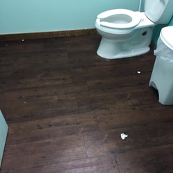 Tropical Smoothie Cafe - Nasty toilet seat and toilet paper on the ground in the women's bathroom