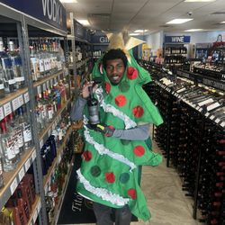 PK Wines & Liquors - Employee in the Holiday Spirit