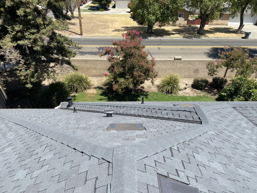 Slide of Modern Roofers and Restoration