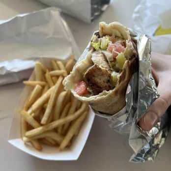 Baladi - Chicken Kebab wrap, with lettuce, tomatoes, onion, and pickles; seasoned fries. - Arabic Near Me - Riverside, California Baladi - Chicken Kebab wrap, with lettuce, tomatoes, onion, and pickles; seasoned fries. - Arabic Near Me - Riverside, California