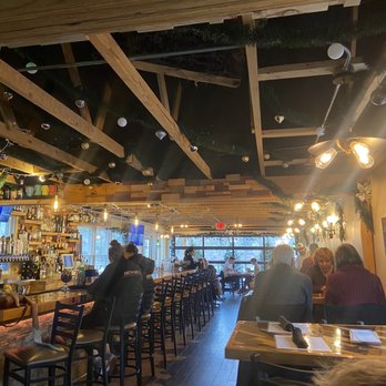 MJ's Bar And Restaurant - people sitting at the bar - New American Near Me - Owego, New York