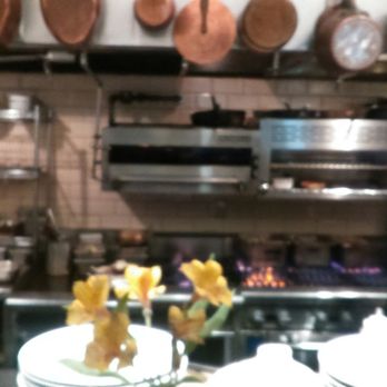 Lunetta Dining Room & Bar - Dining in front of open kitchen bar counter - New American Near Me - Santa Monica, California