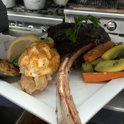 Popei's Clam Bar - Tomahawk ribeye and lobster tail