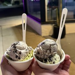Split scoop in a cup, mallow cookies and cream & matcha honeycomb (left) and mallow cookies and cream & cookie mintster (right) Split scoop in a cup, mallow cookies and cream & matcha honeycomb (left) and mallow cookies and cream & cookie mintster (right)